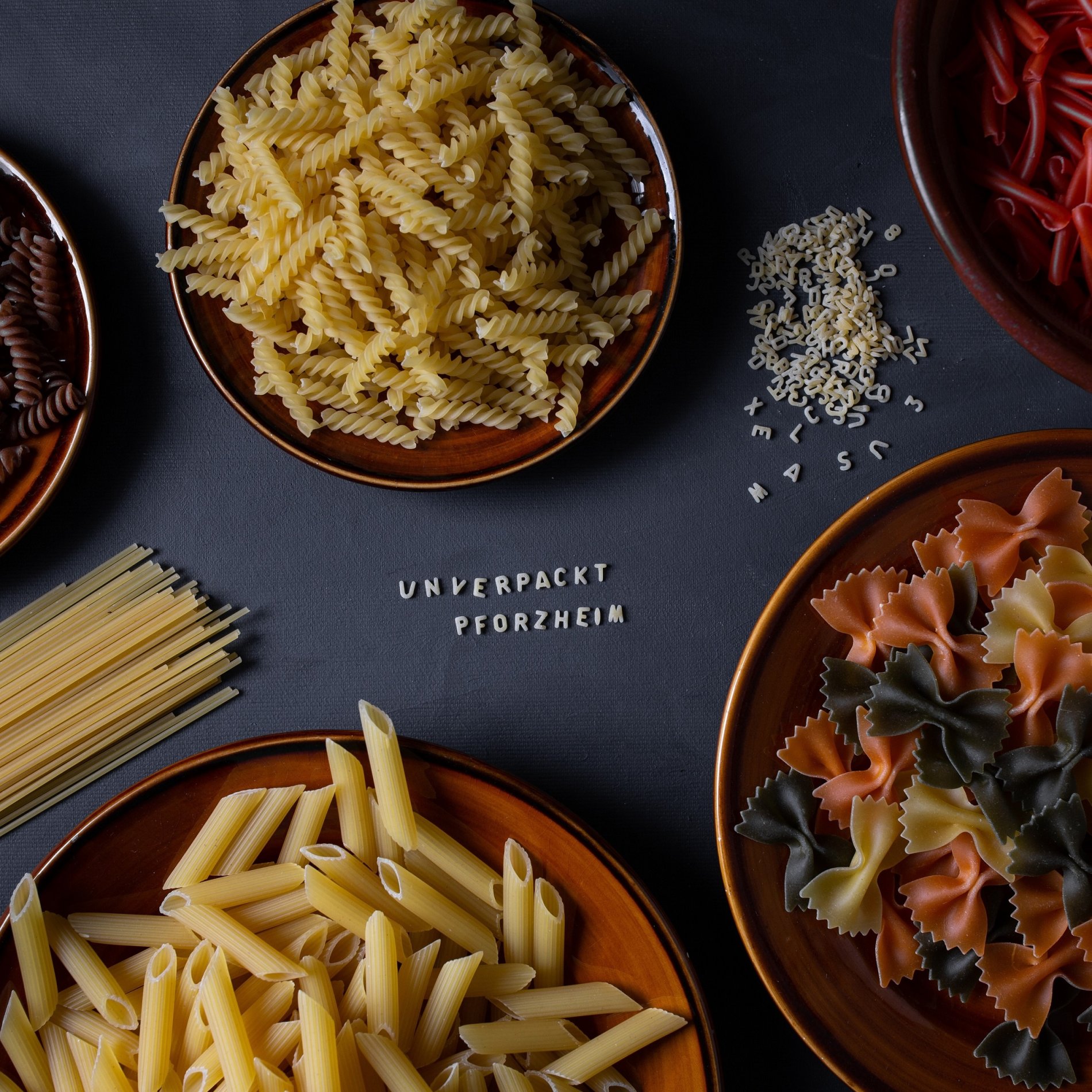 Various types of pasta and with letter noodles "Unverpackt Pforzheim".