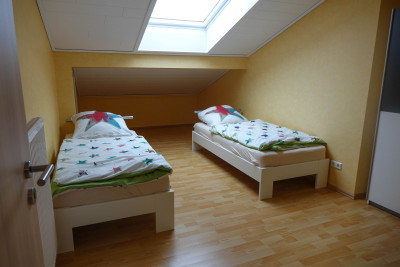 Schlafzimmer mit Einzelbetten | Ferienwohnung Boger in Güglingen